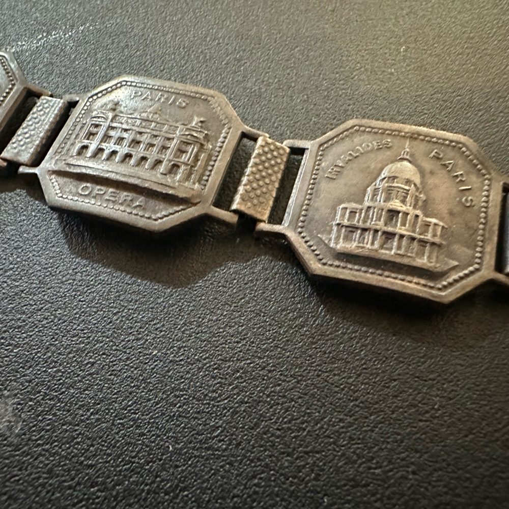 Intricate Silver bracelet with French imagery